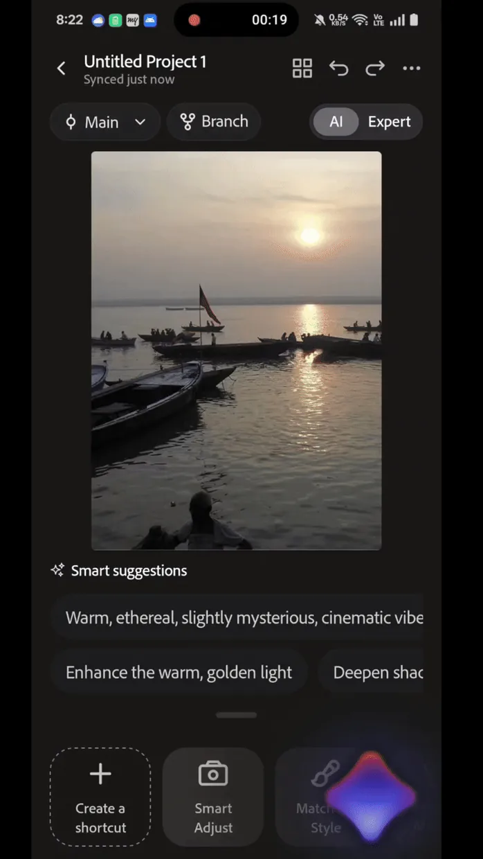 A photo in, and Feather suggests edits for it: "Enhance the warm, golden light".